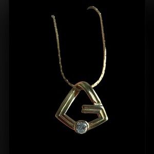 Givenchy gold-tone geometric pendant with a rhinestone necklace